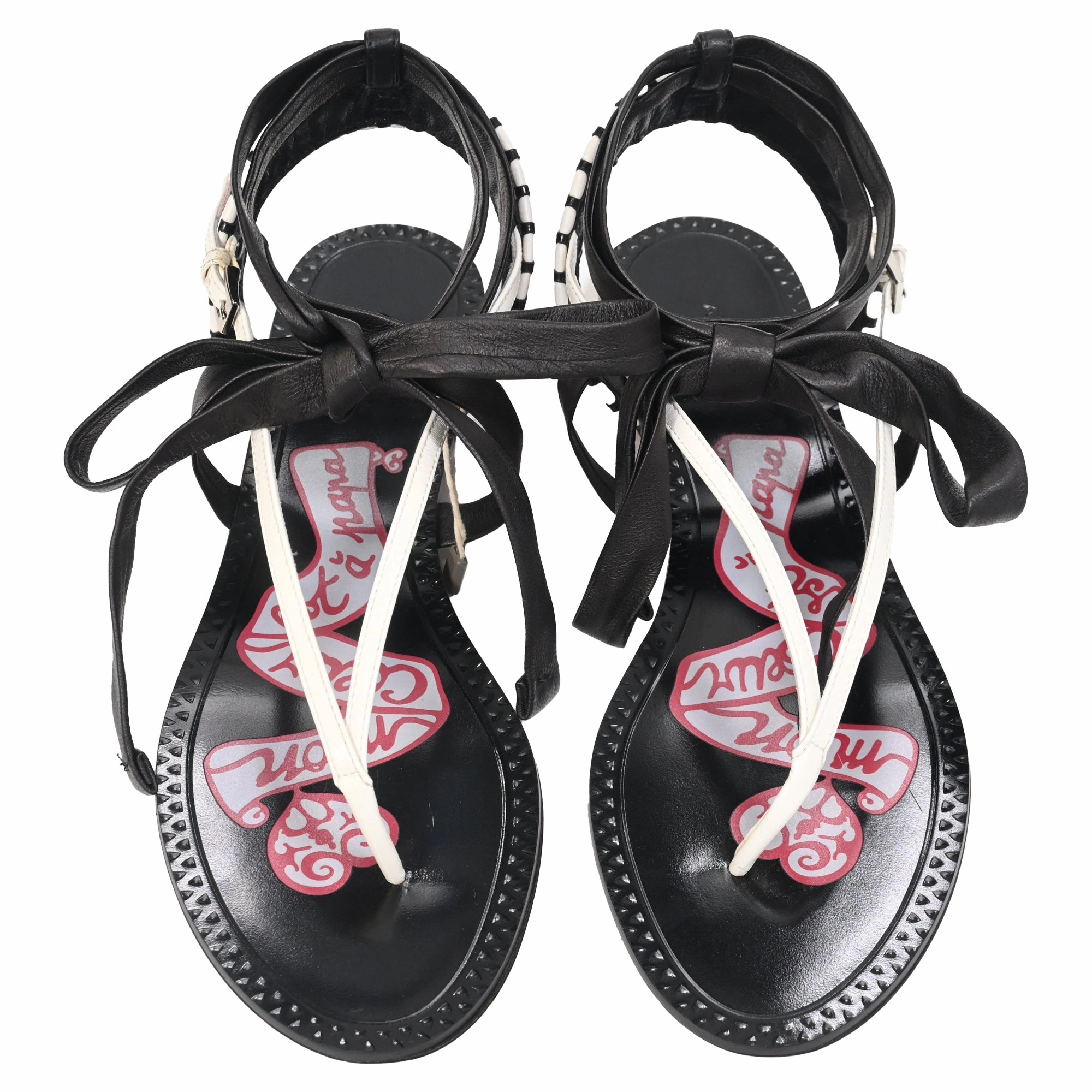 Alaa Graphic Print Gladiator Sandals in Black Leather